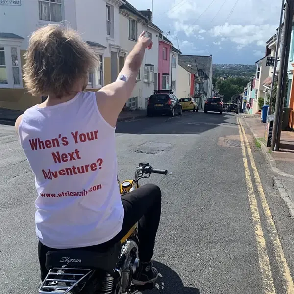 Africa Rally wearing vest back